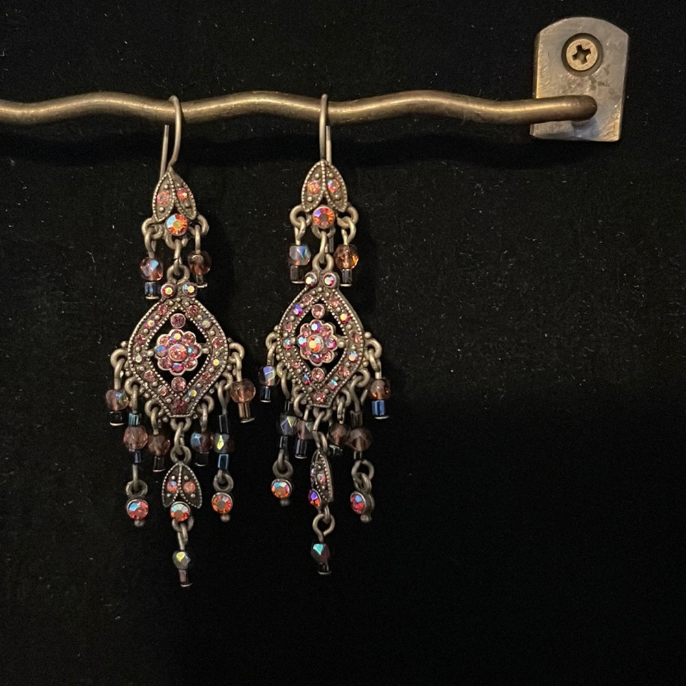 Artificial earrings with multi colours pink , purple with brown base
